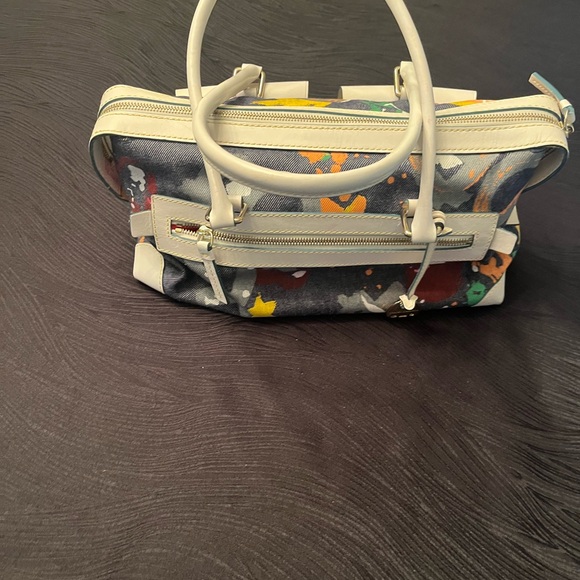 Dooney & Bourke White and Blue denim purse with locking front pockets. - Picture 1 of 12